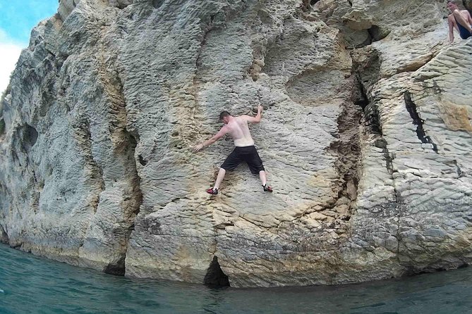 Deep Water Solo and Cliff Jumping Tour in Split - Learning the moves before you commit to the climb