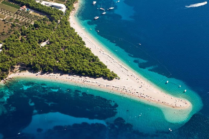 From Split: Catamaran Cruise to Golden Horn & Brač island. - Back to Split at Sunset: Snacks, Music, and One Last Look