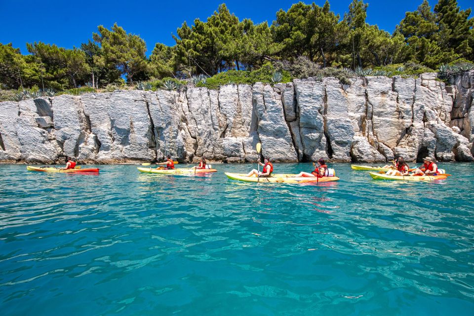 From Split: Sea Kayaking Tour - Kašjuni Beach Break: Snorkel, Swim, Photos, and the Cliff Jump Choice