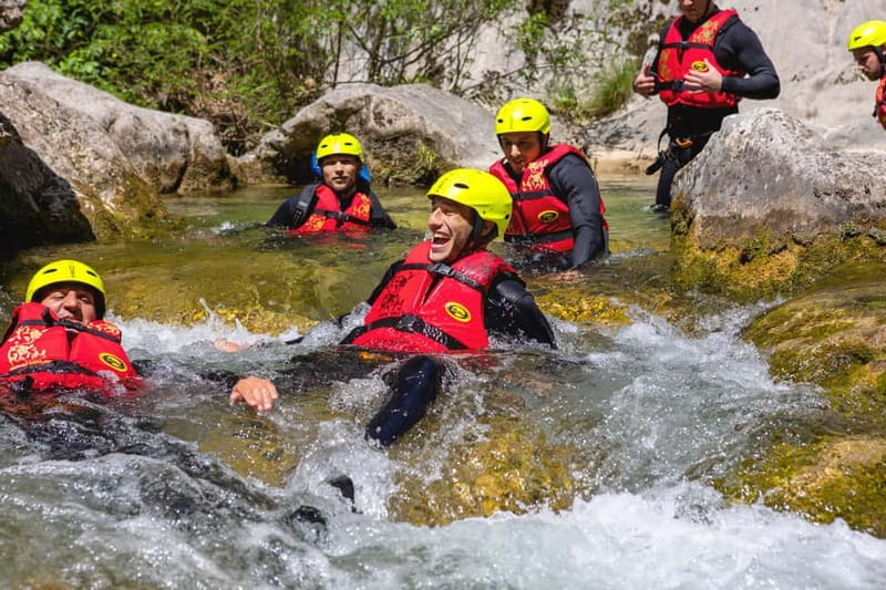 From Split/Šestanovac: Canyoning on Cetina River - The Core Route: From Tunnel Hike to Slides, Jumps, and Swimming