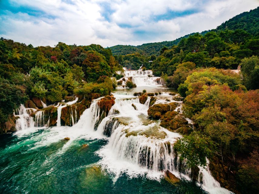 From Split & Trogir: Krka Waterfalls Day Tour with Boat Ride - Skradinski Buk and the travertine cascades: your walking time