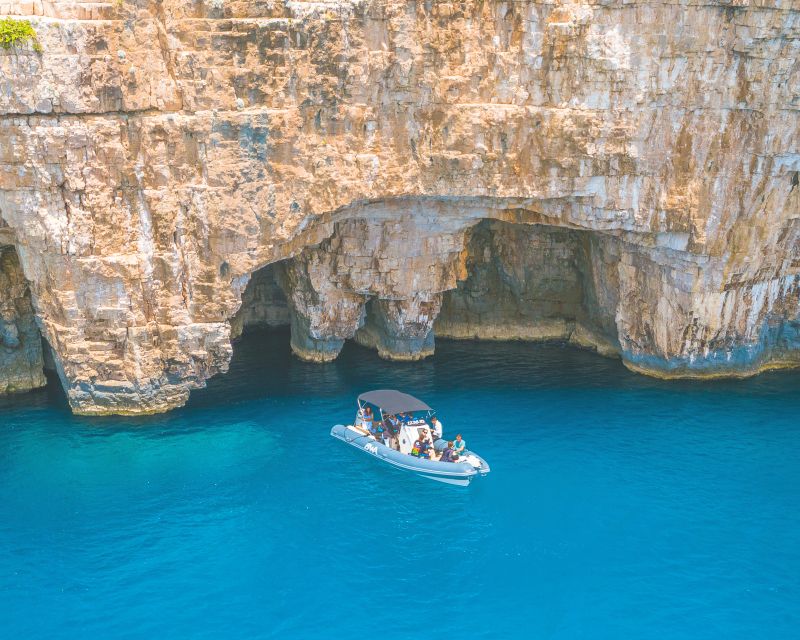 From Trogir or Split: Full-Day Blue Cave & Hvar Island Tour - Komiža on Vis: Fisherman Village Charm and Food You’ll Want to Try