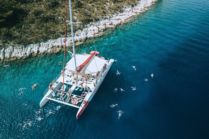 Full-Day Catamaran Cruise to Hvar & Pakleni Islands with Food and free Drinks - Hvar Town: Guided Highlights, Then Time to Wander