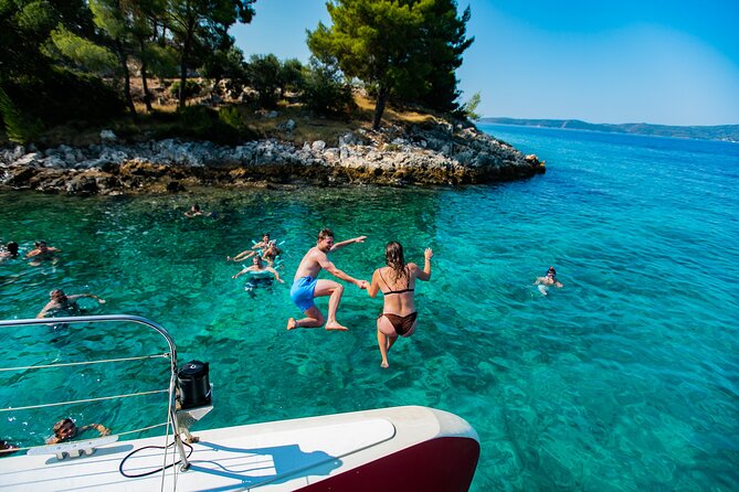 Full-Day Catamaran Cruise to Hvar & Pakleni Islands with Food and free Drinks - Pakleni Islands Swim Stop: Hidden Bays and Open Bar Energy