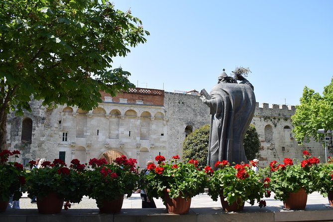 Grand Split Walking Tour with Diocletian's Palace - Stop 2: City Clock in the square—small detail, big meaning