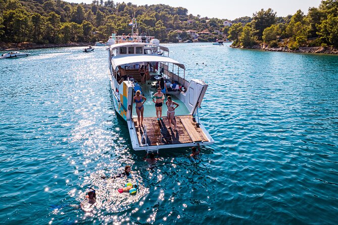 Split: Blue Lagoon, 3 Island Boat Tour & Mediterranean Lunch - Blue Lagoon (Krknjaši): Swim, Snorkel, and the Waterslide Moment