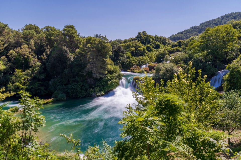 Split: Krka Waterfalls Guided Day Trip with Swim & Boat Tour - The 30-minute boat cruise to Skradin: a different angle on the same wonder
