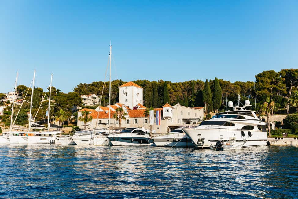 Split/Trogir: Blue lagoon and 3 islands speedboat tour - Stop 2: Blue Lagoon and Krknjasi Bay—Snorkeling, Cold Water, and Rocky Shore Reality