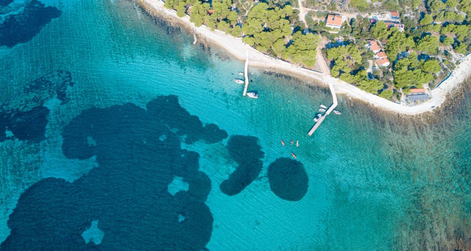 Trogir: Blue Lagoon, Maslinica, and Solinska Bay Boat Tour - Solinska Bay: The Jump, the Pine Beach, and the One-Hour Reset